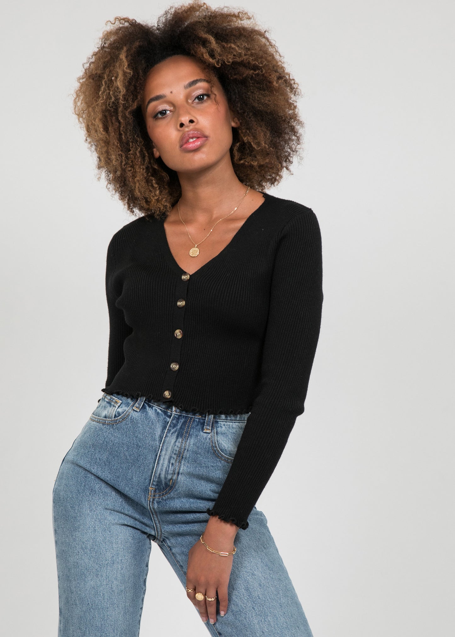 Cárdigan de botones con dobladillo con volante negro