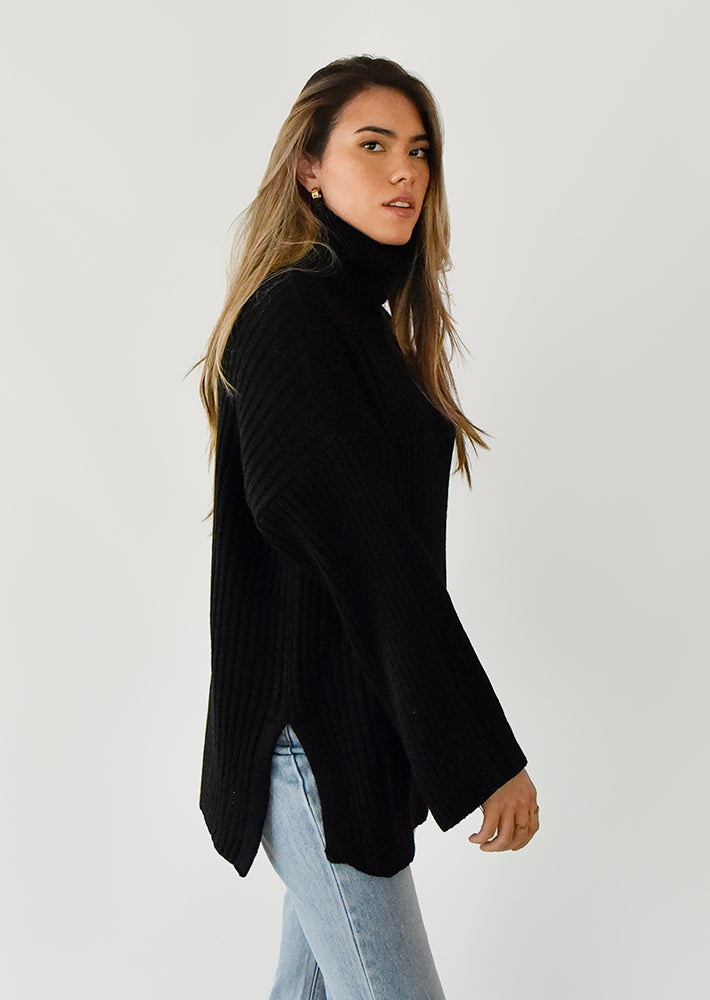 Pull col roulé noir