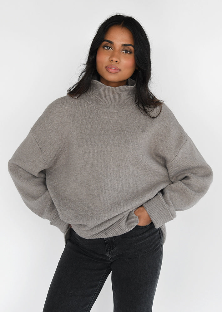 Pull en maille à col montant