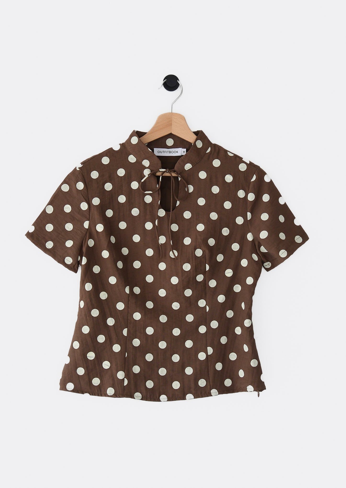 Top avec col à nouer à pois