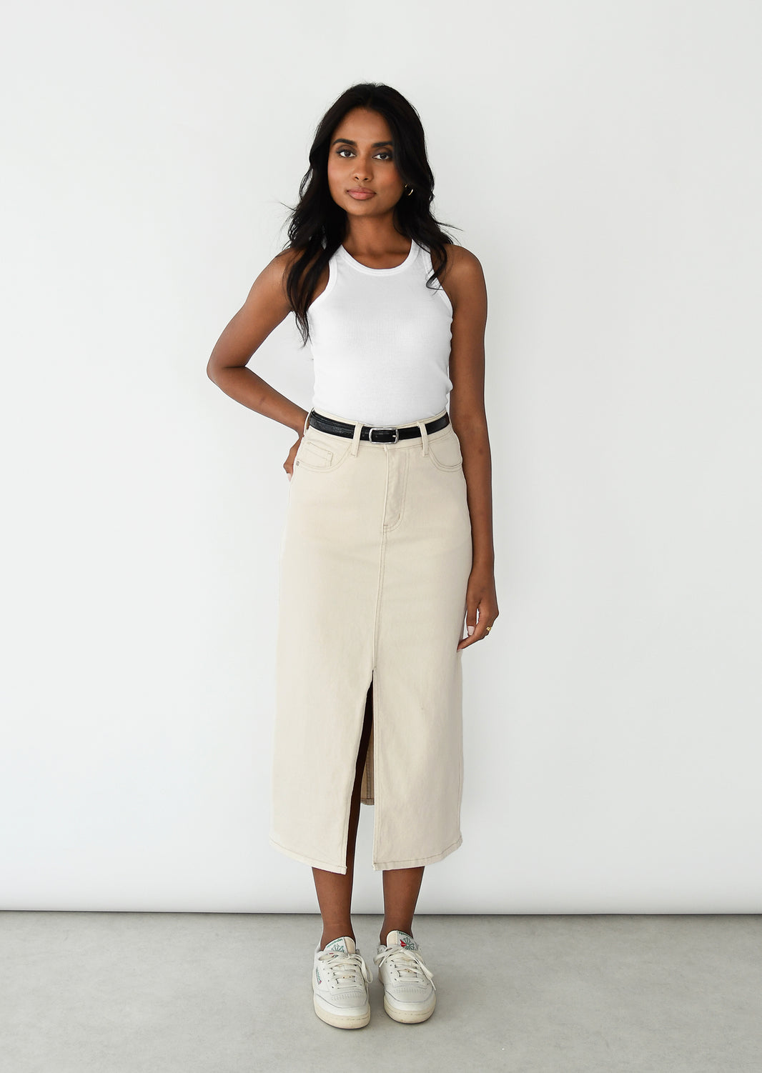 Mid length denim skirt with slit