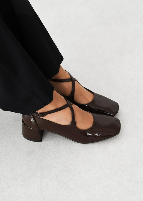 Cross-strap heeled Mary Janes –