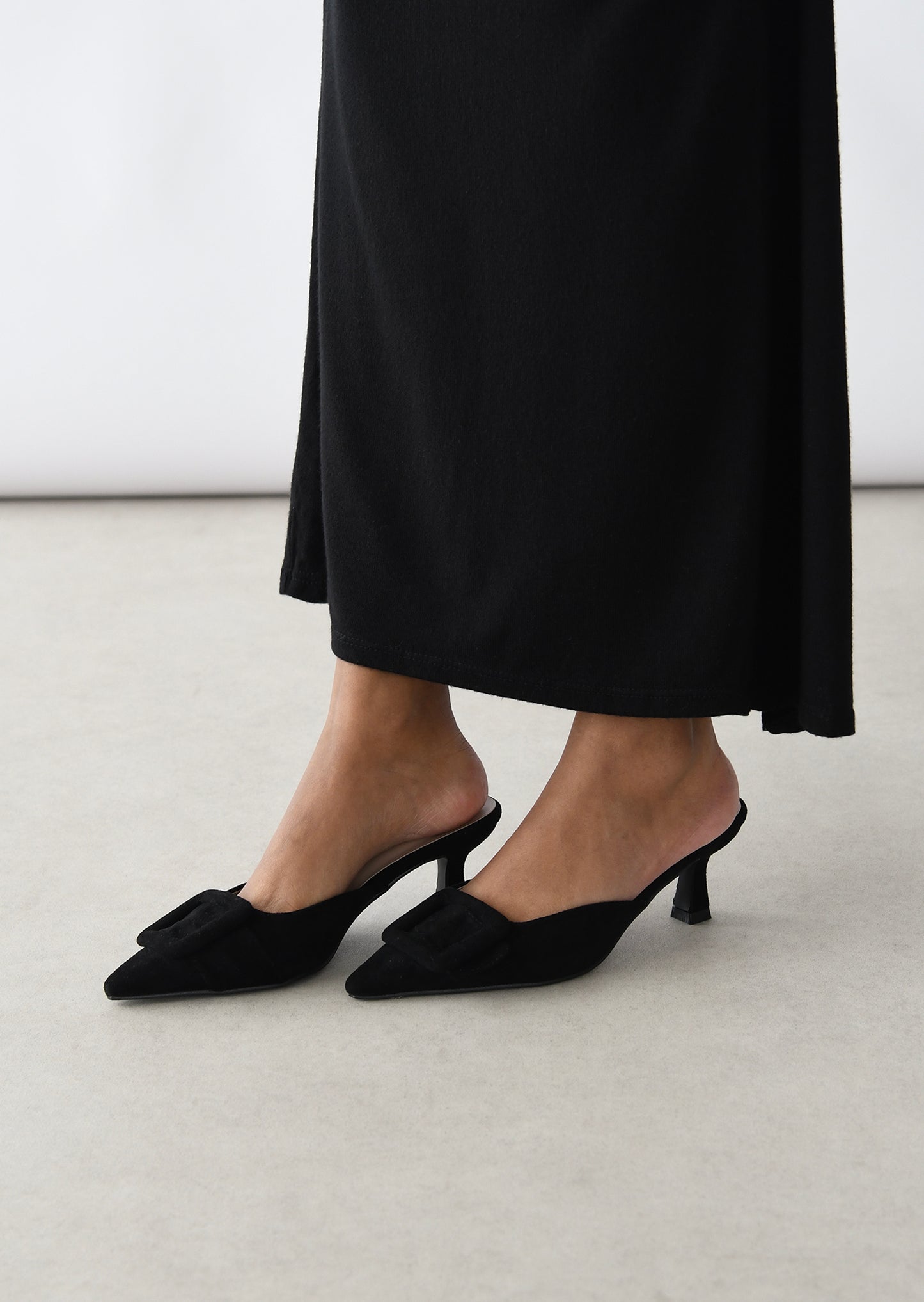 Mules à talons avec boucle