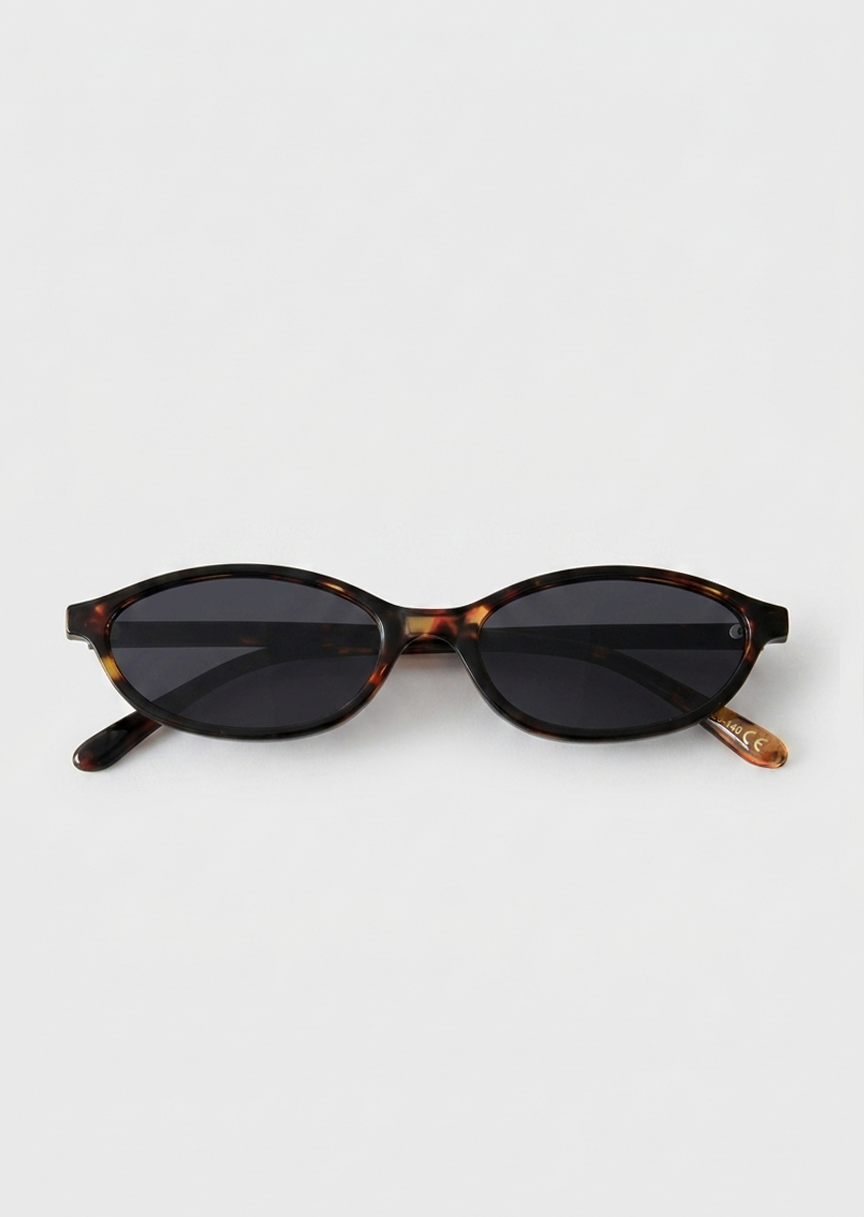 Skinny oval sunglasses in tortoiseshell 