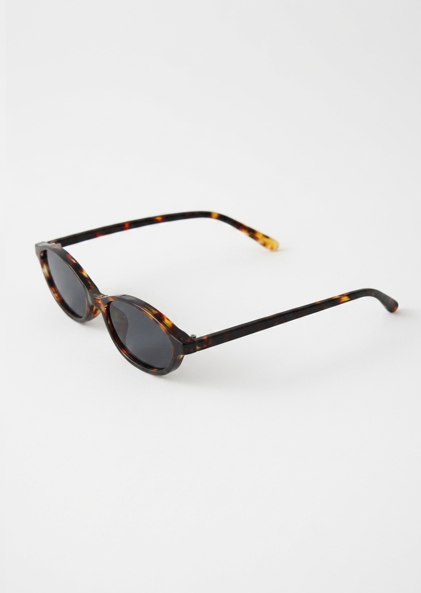Skinny oval sunglasses in tortoiseshell 