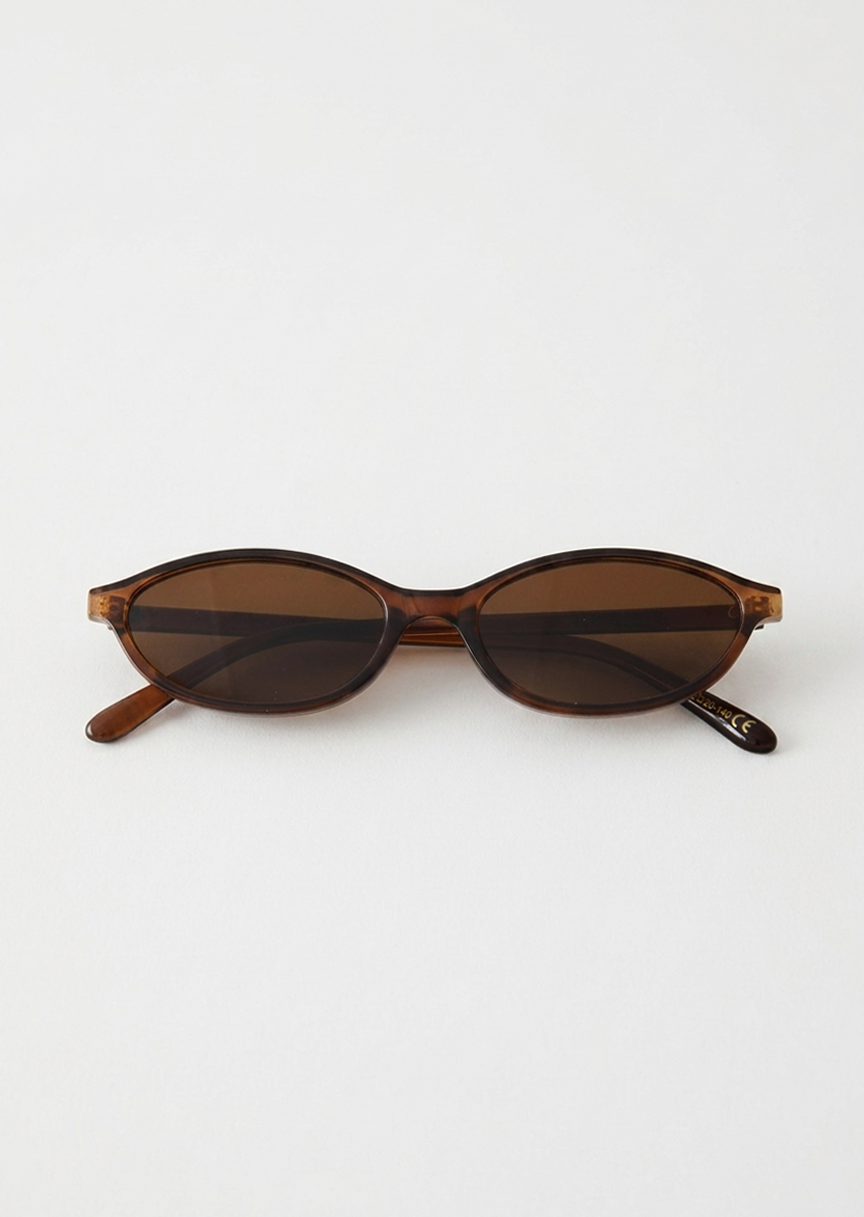 Skinny oval sunglasses in brown