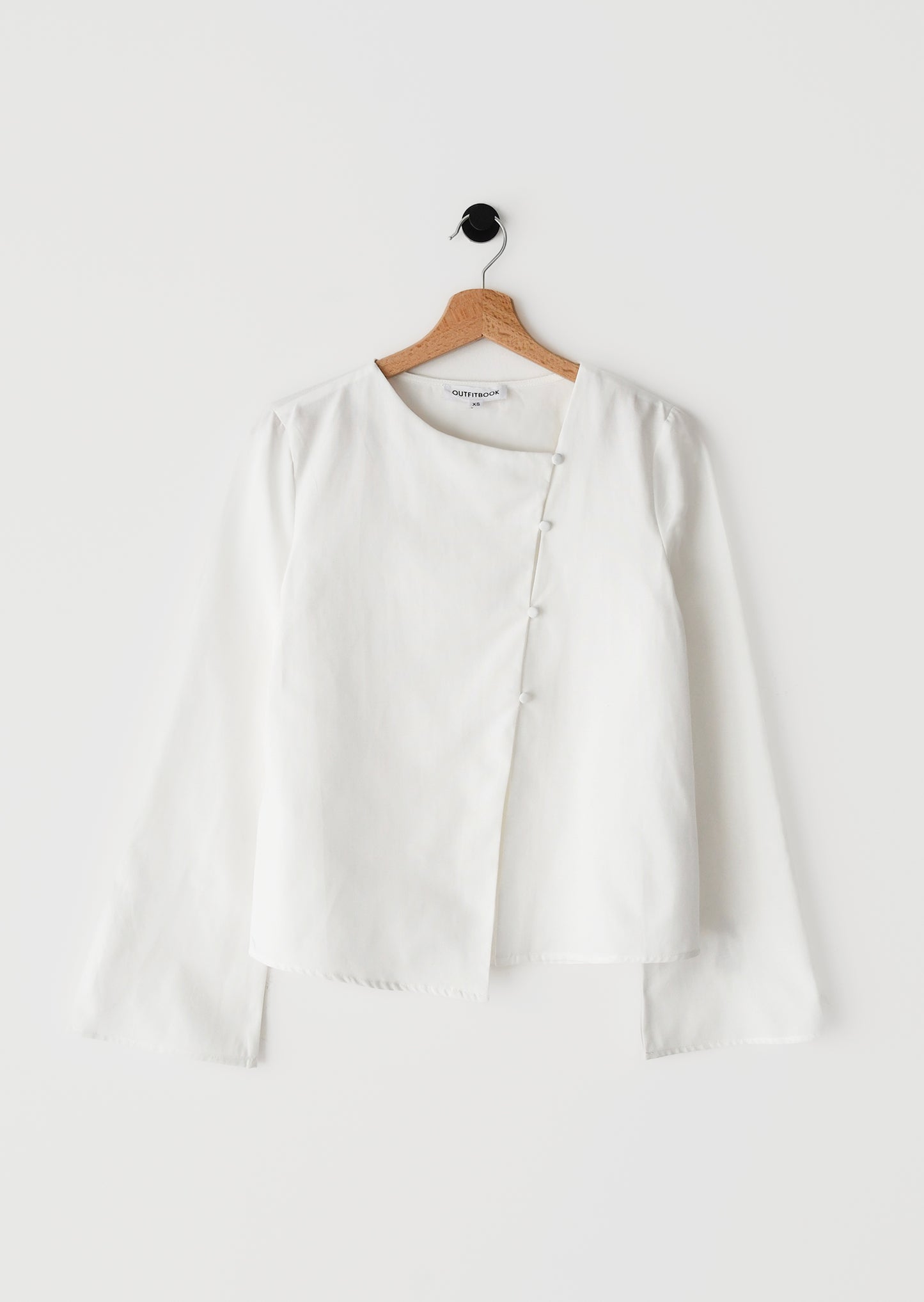 Blusa asimétrica con botones