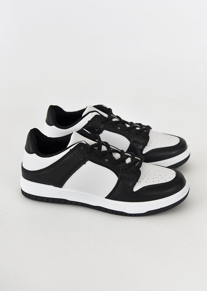 Cheap black hot sale and white sneakers