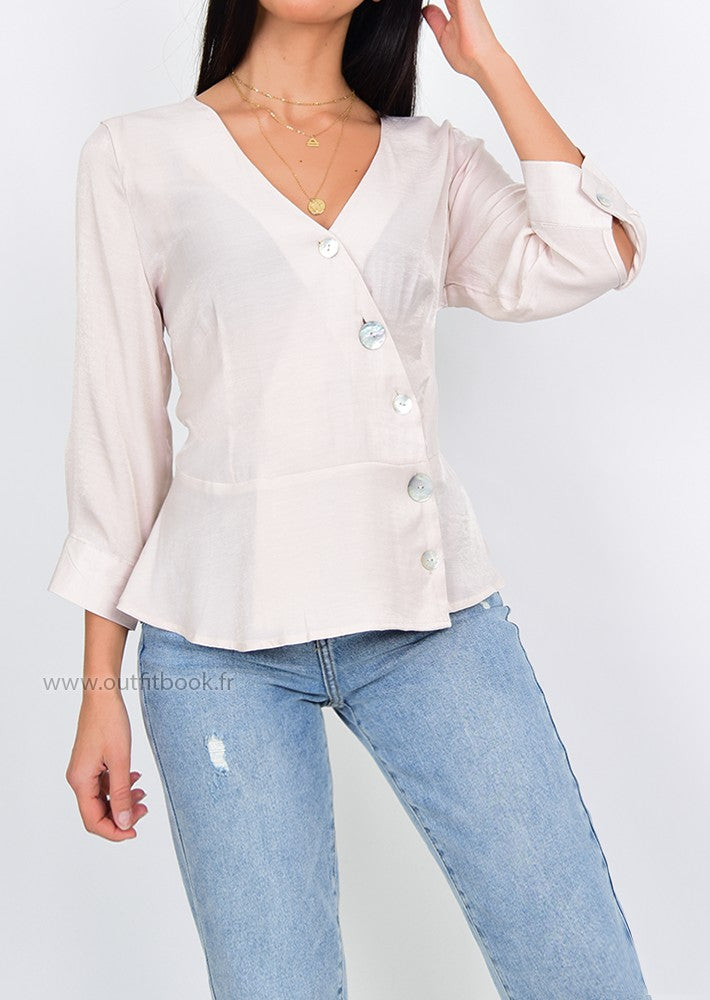 Beige blouse with buttons