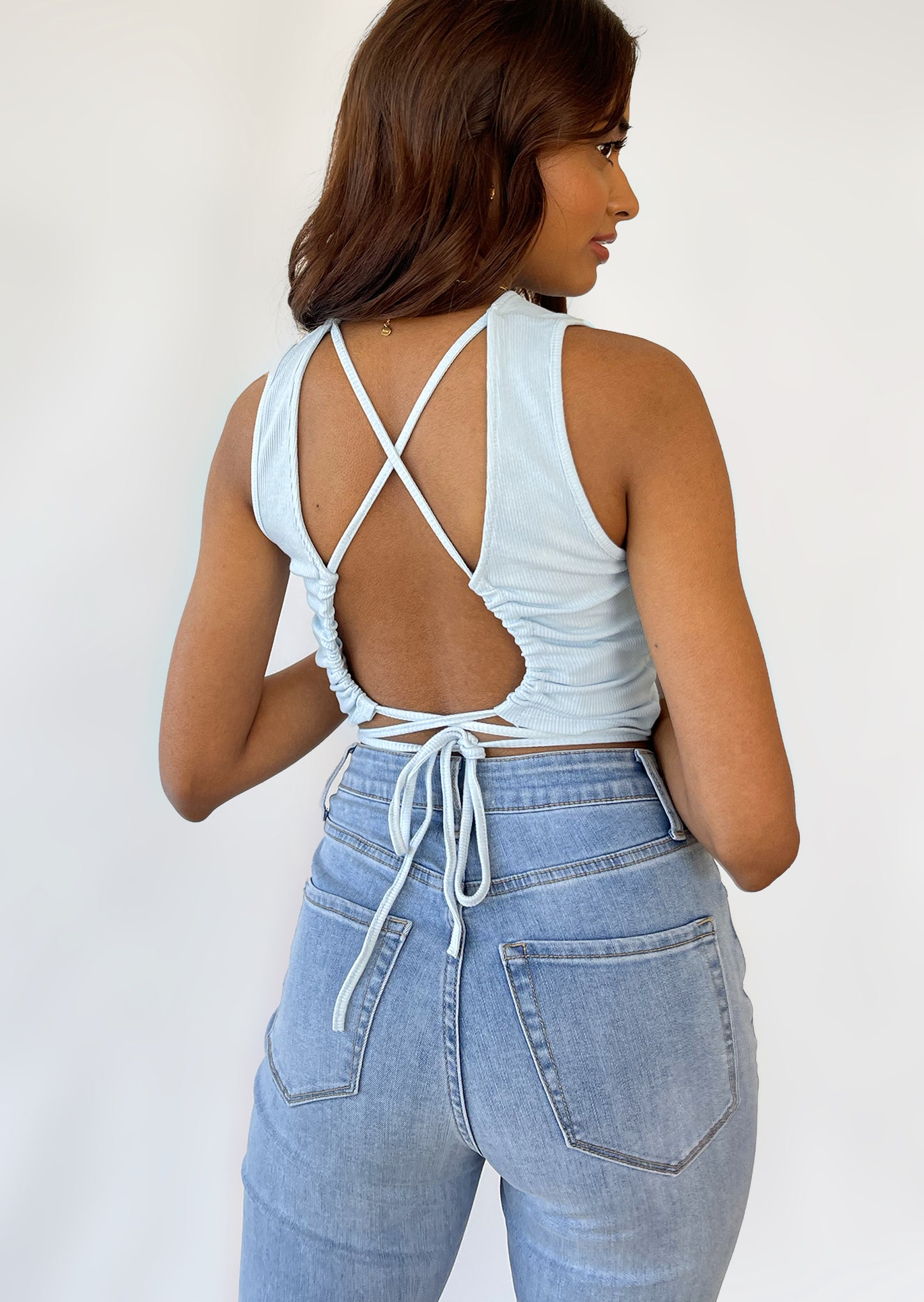 Open back top with cross tie detail in blue
