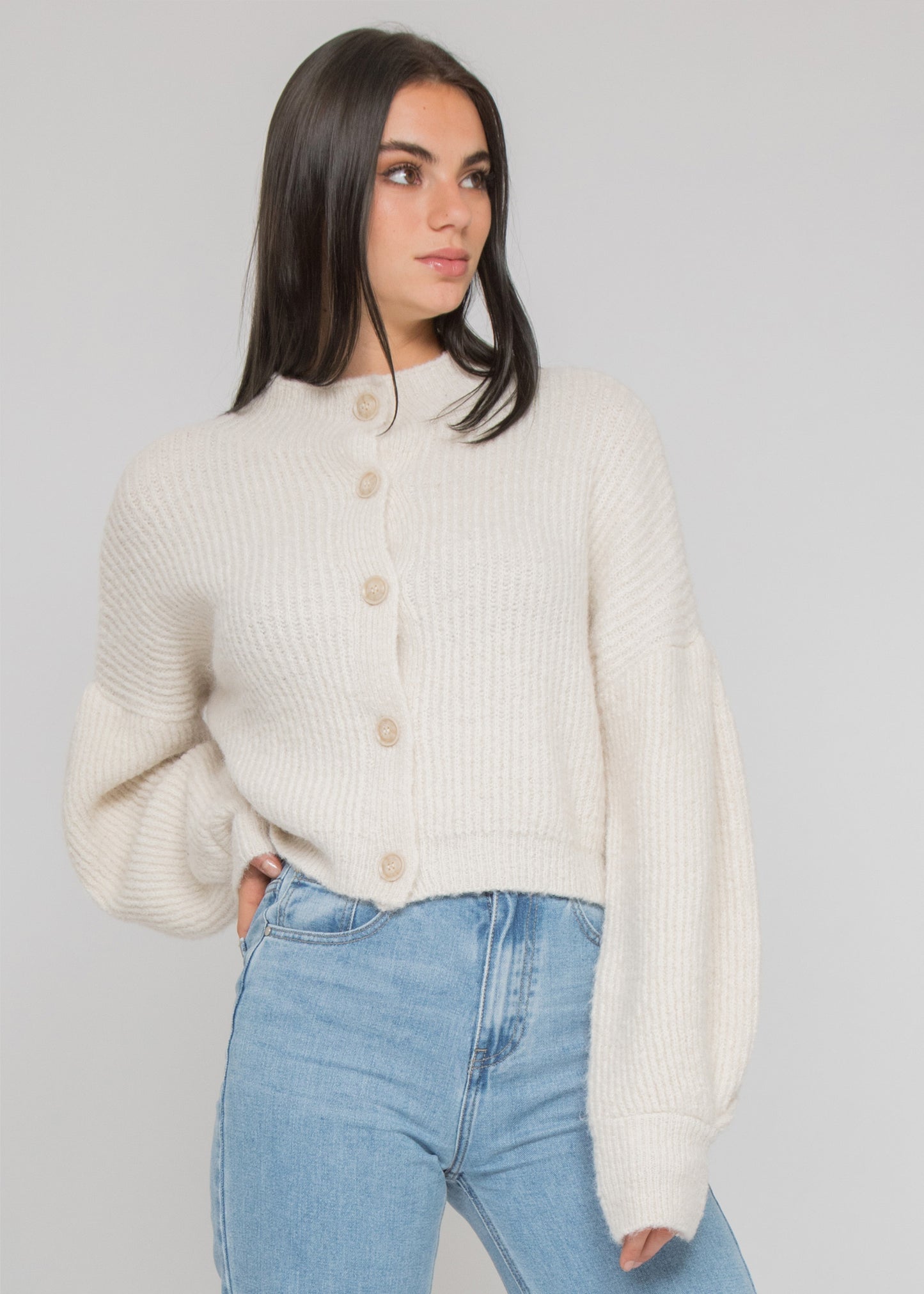 High neck knitted cardigan with buttons in beige