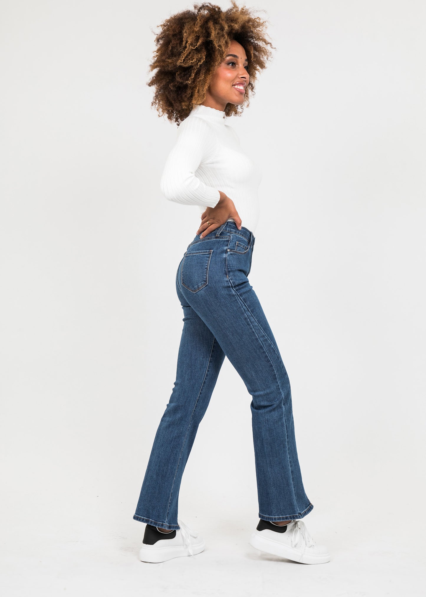 Flare jeans with splits hem in dark blue