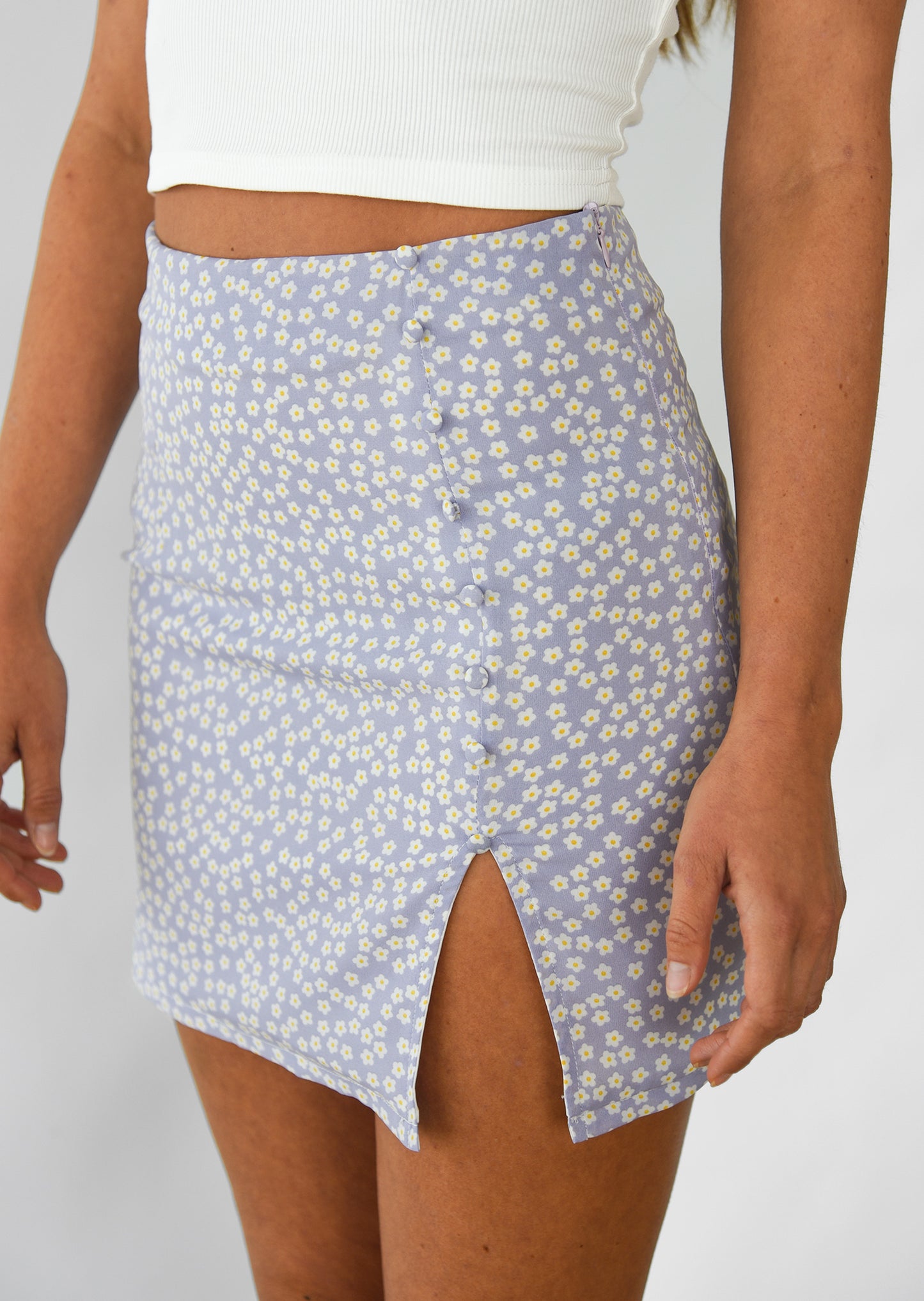 Lilac floral mini skirt with front split and buttons details