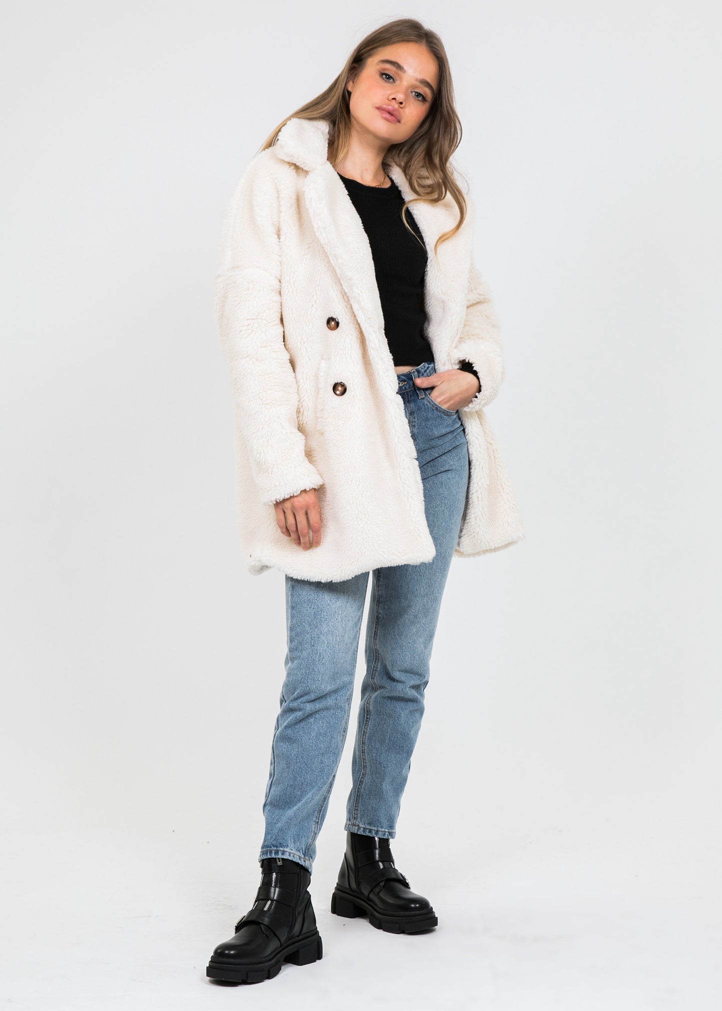 Manteau fausse fourrure crème