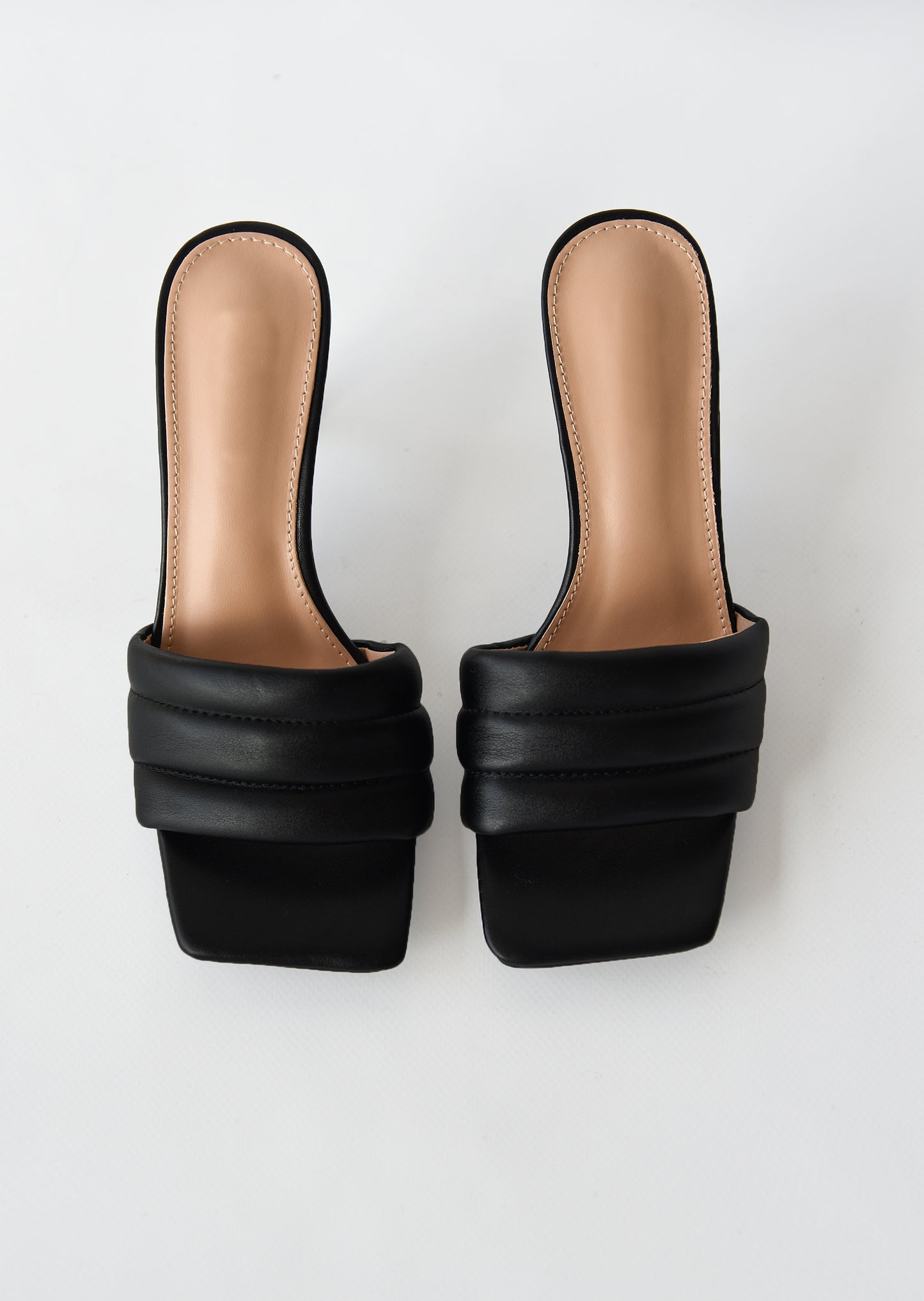 Black quilted mules