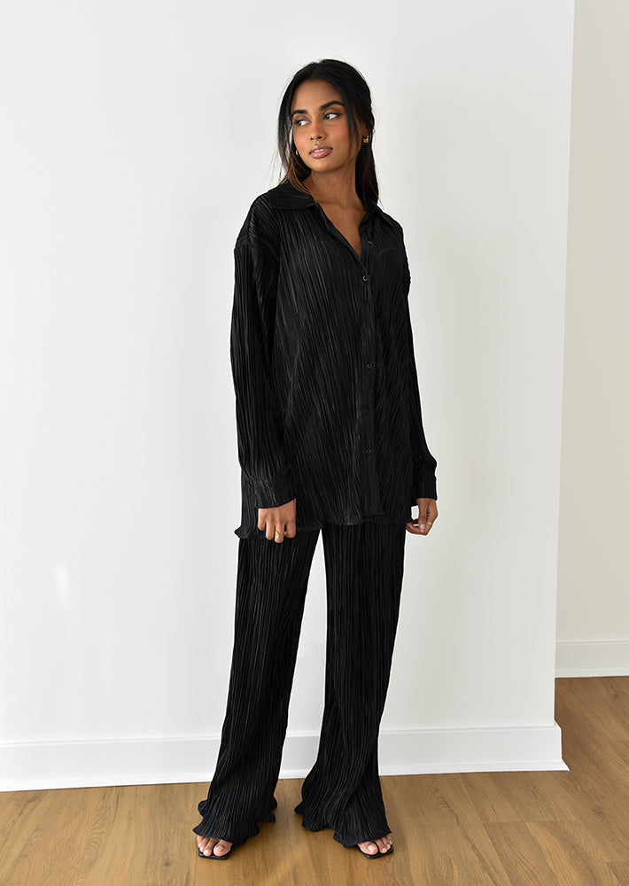 Pantalon en satin plissé
