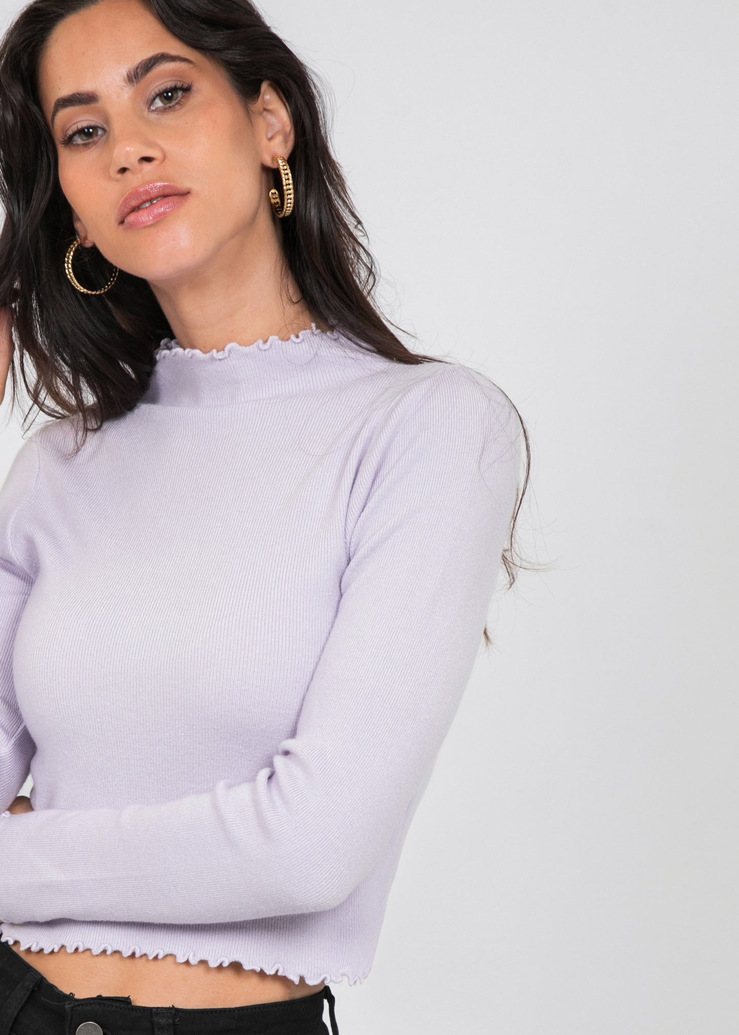 High neck jumper with ruffle hem in lilac