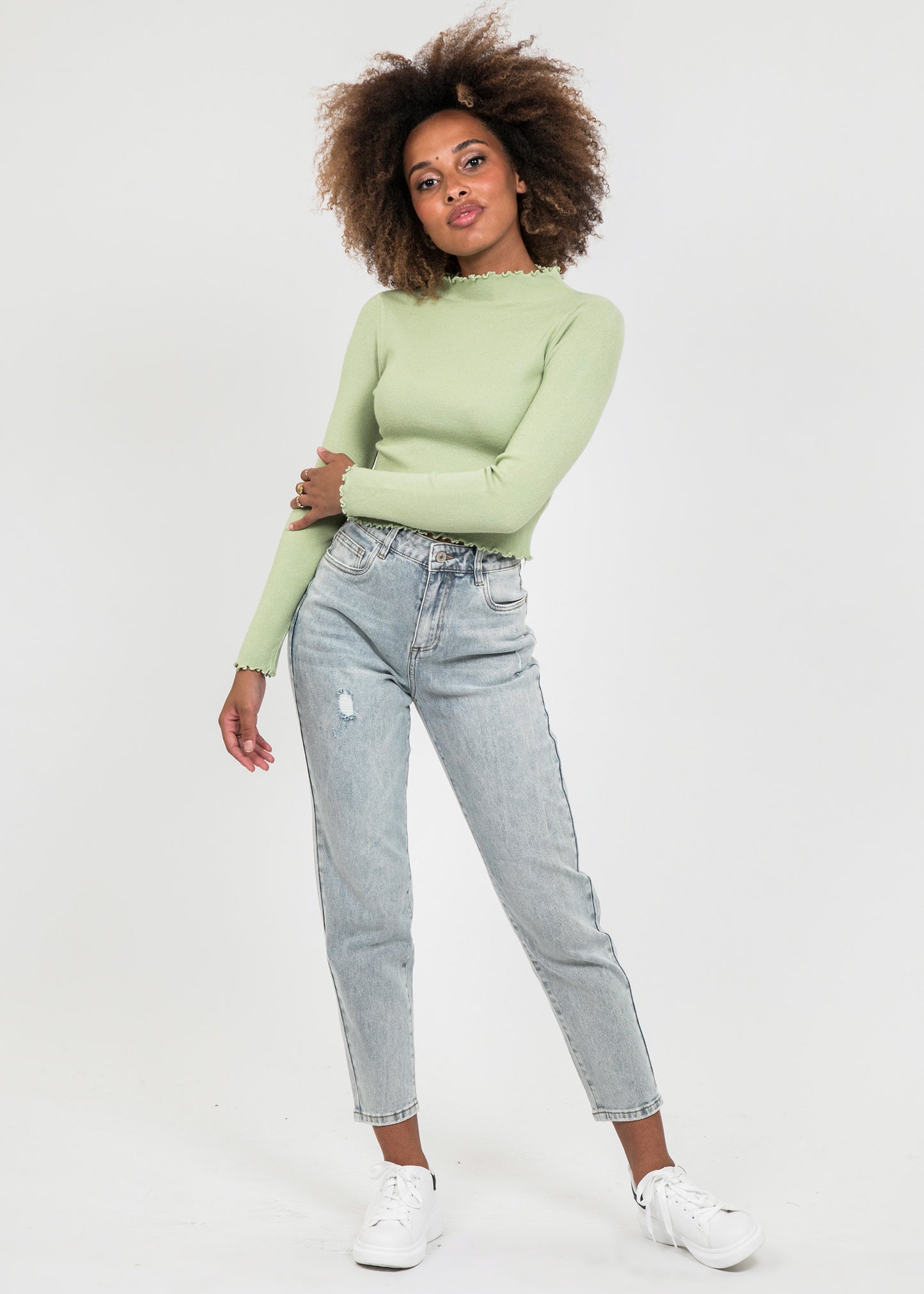 High neck jumper with ruffle hem in green