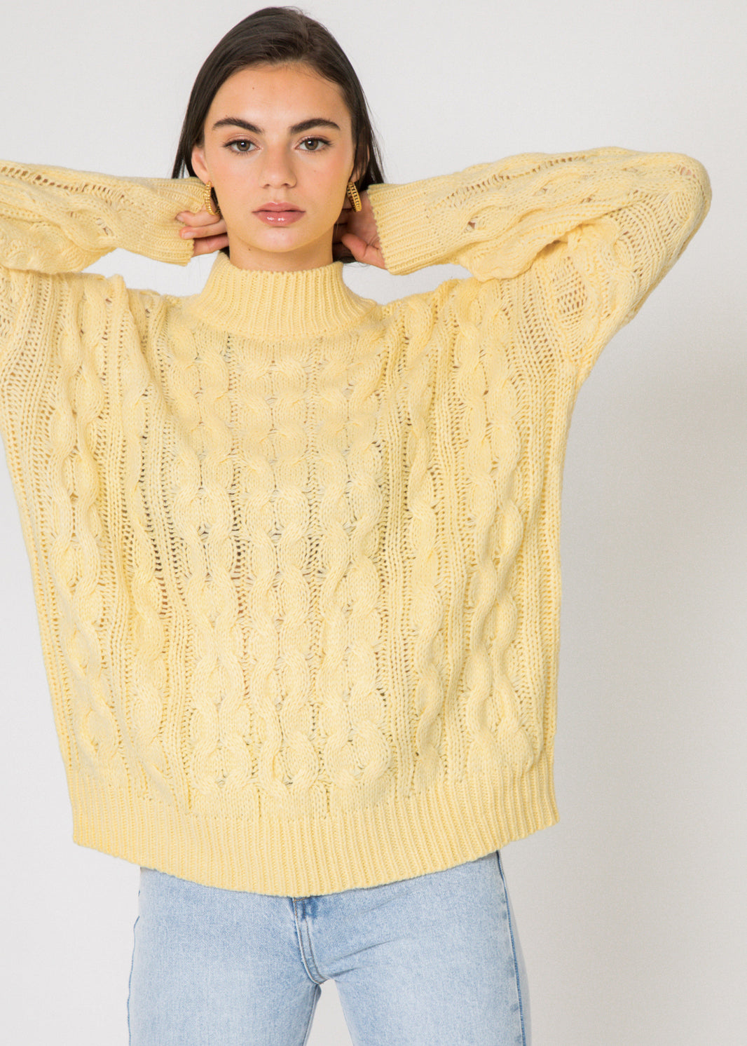 Pull col haut en maille torsadée jaune pastel