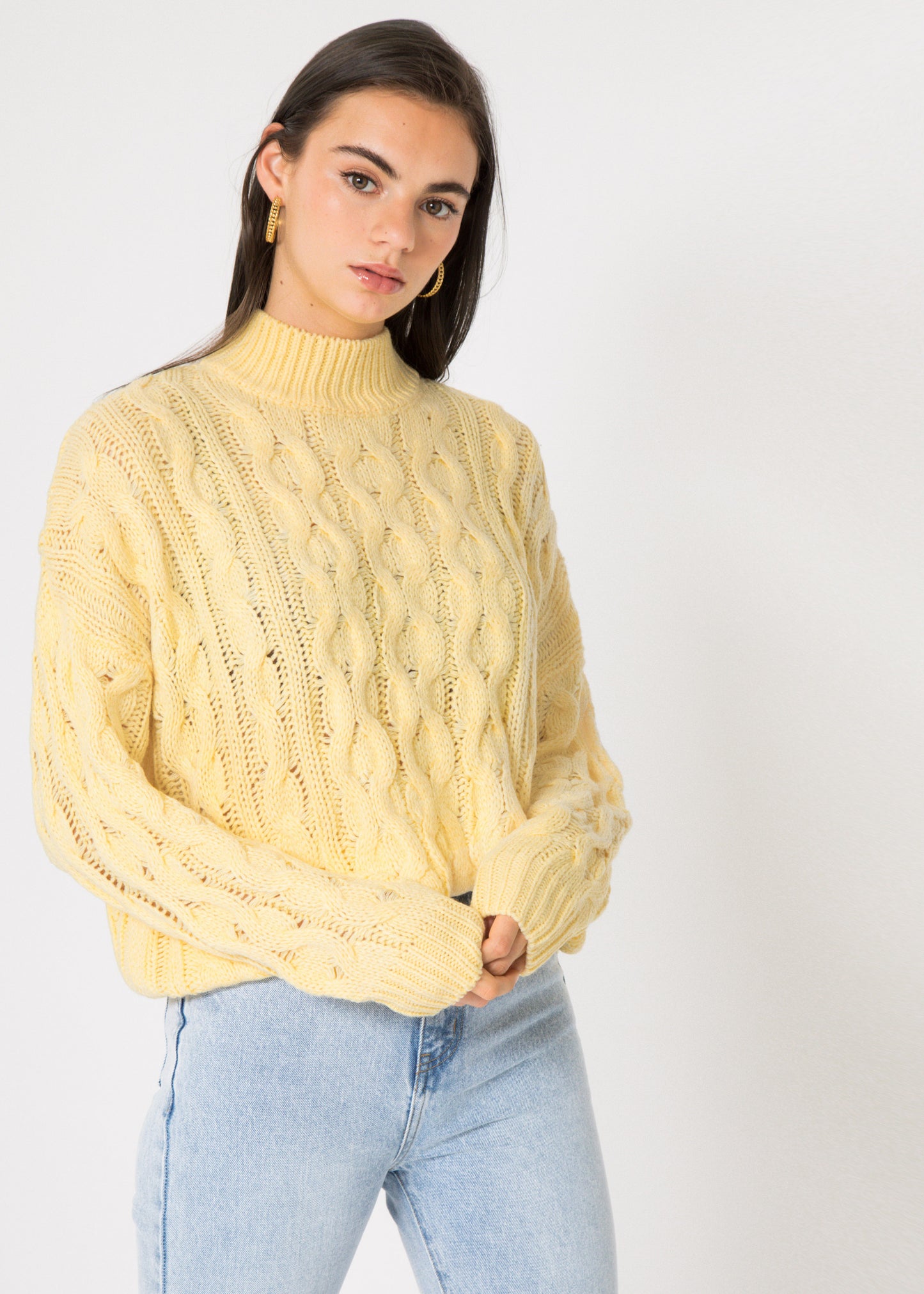 Cable knit high neck jumper in pastel yellow