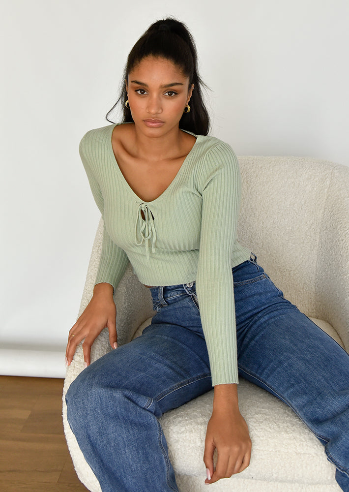 Jumper with cut out detail in green