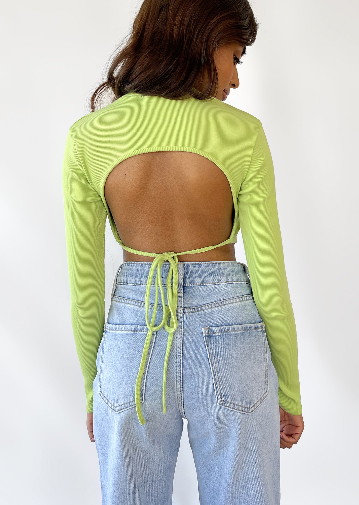Open back long sleeve top with scarf hem in green