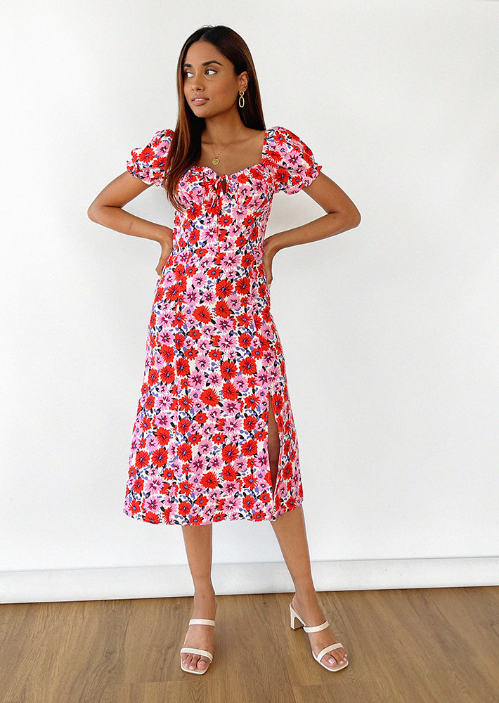 Robe mi-longue fendue rose fleurie